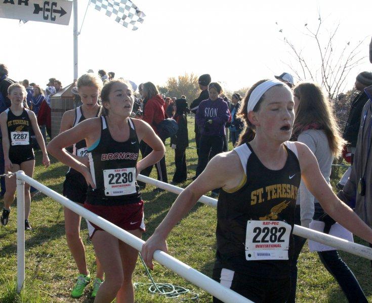   STA senior Katie Hornbeck finishes the Sectionals race with her best personal time Saturday, Nov. 2. Hornbeck was the fourth runner for STA.