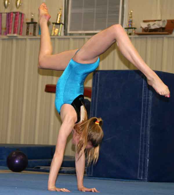 STA freshman, Kennedy Reller, practices her floor routine on April 20 at eagles gymnastics. Reller has done gymnastics competatively at Eagles since she was 7.
